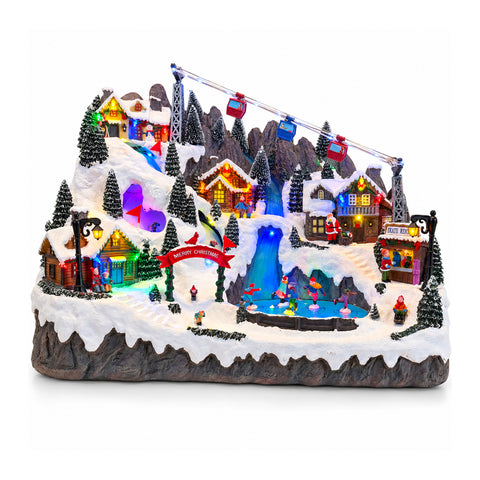 Verlicht kerstdorp met bewegende ski- en schaatspistes, ledverlichting en muziek – 56x37x42 cm