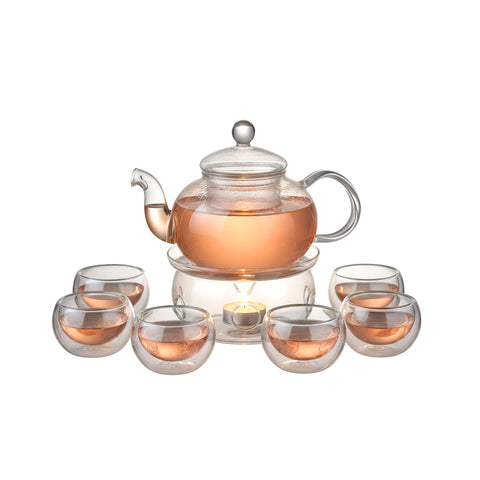 Theeservies van borosilicaatglas met infuser en verwarmingskaars
