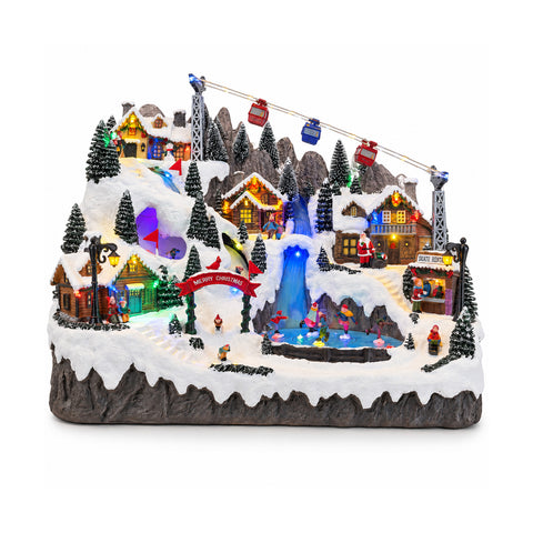saint joy villaggio di natale luminoso con piste da sci e pattinaggio in movimento luci led e musica 56x37x42 cm ean 8056819207859