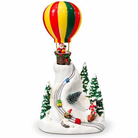 saint joy paesaggio natalizio con babbo natale in volo luci led e musica ean 8056819082067
