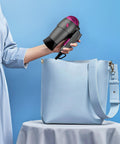 Phon da viaggio Zephir 1200W compatto che entra facilmente in borsa azzurra, asciugacapelli pieghevole ideale per viaggi e spostamenti